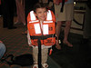 whitearrow > Zoe at the muster drill.  Cutest life-jacket model ever.